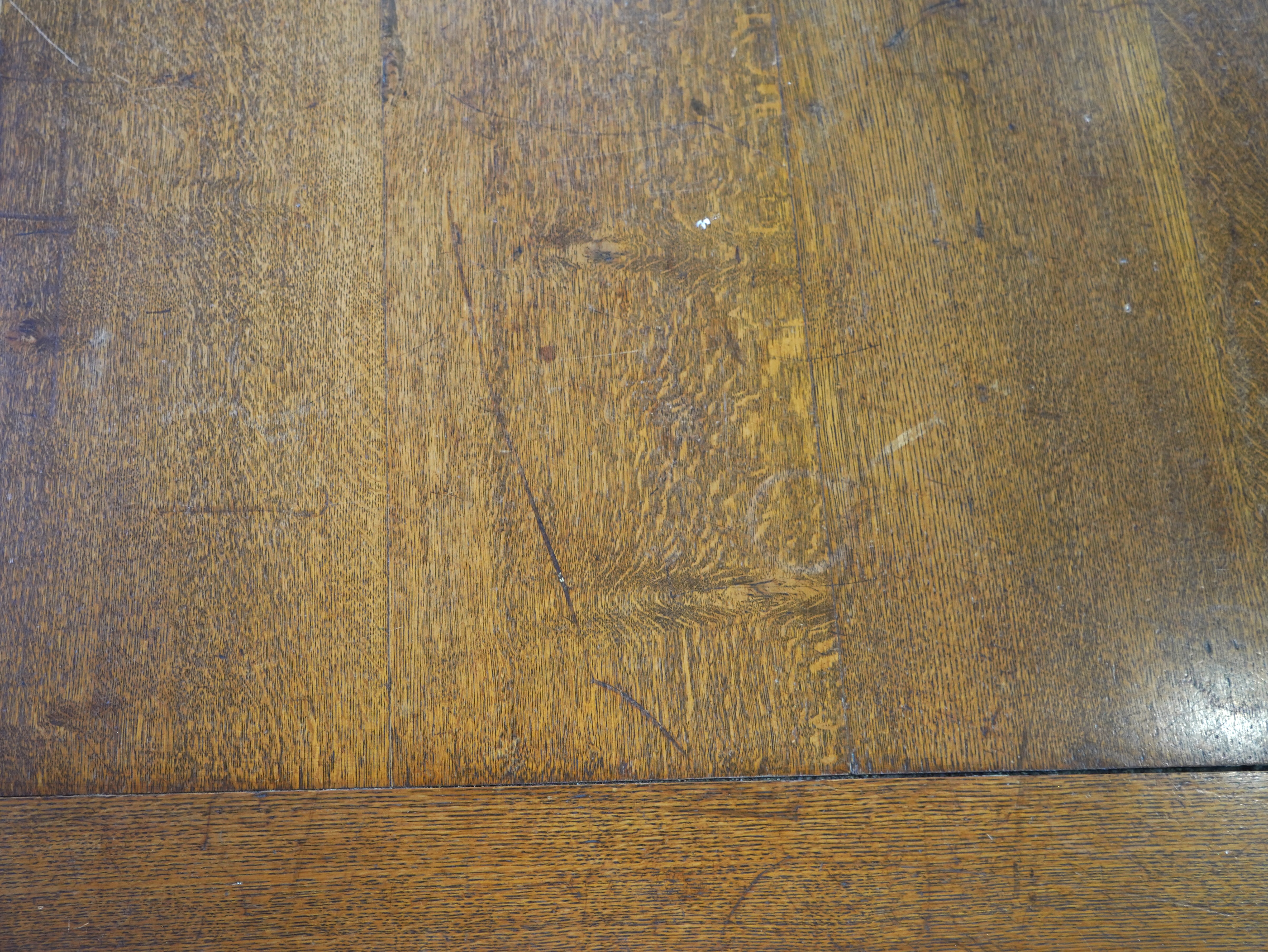 An Arts and Crafts oak refectory dining table